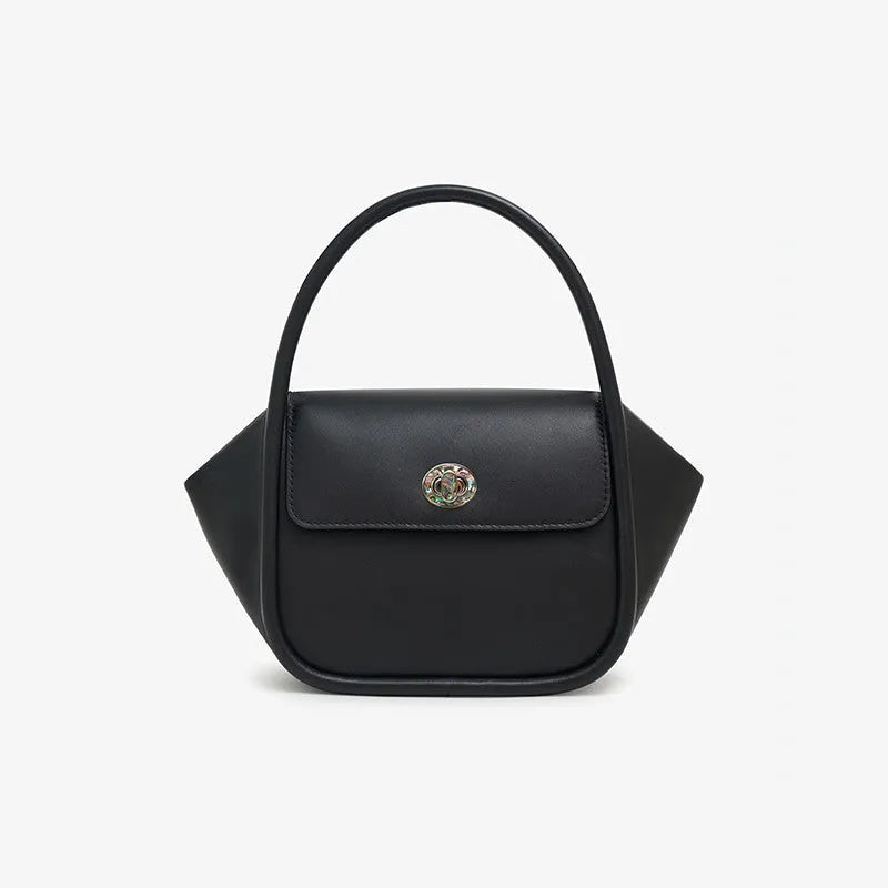 Women's leather wing tote handbag with cross-body strap and hard handle in cow leather