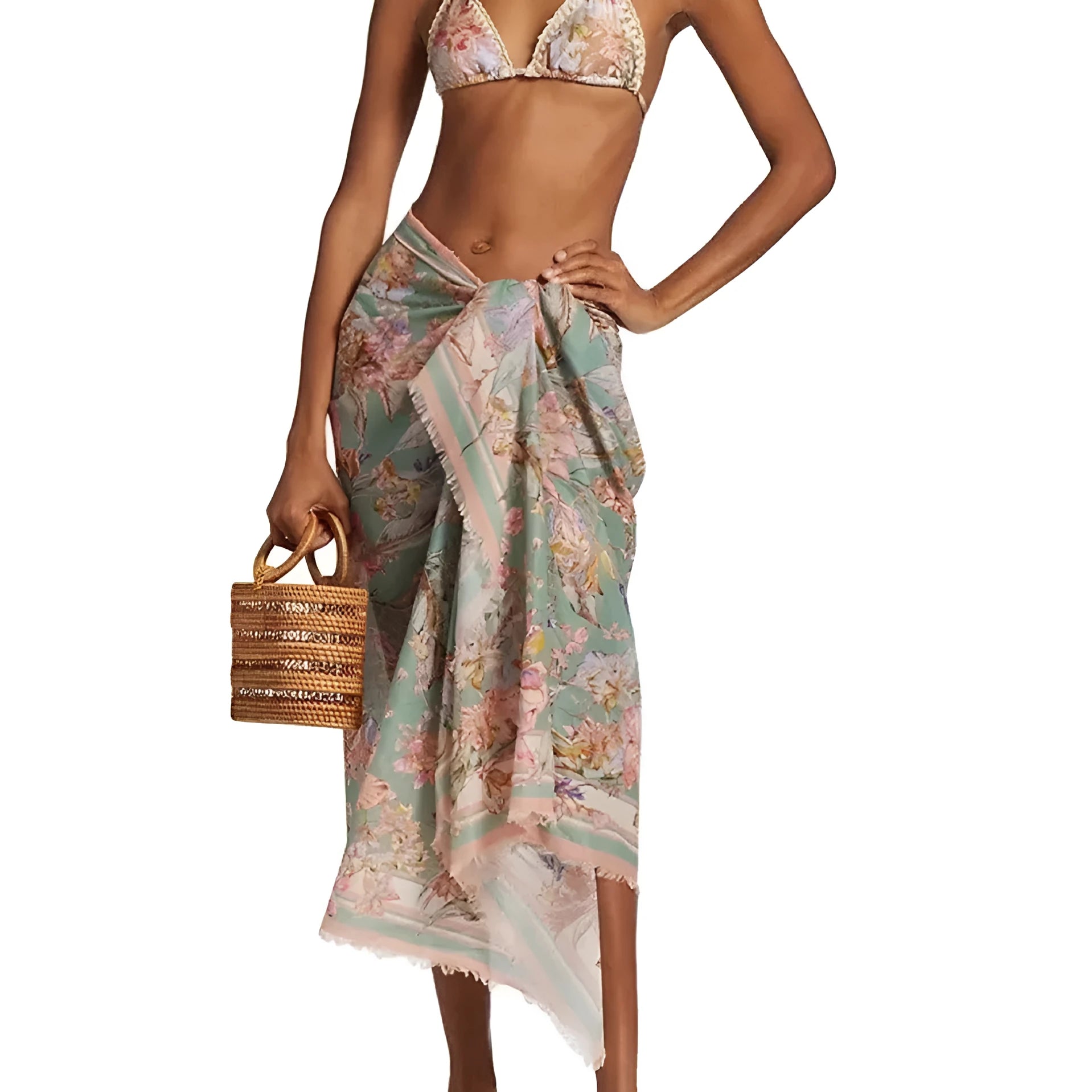 Creamy-white women's floral print bikini set with matching skirt on a hanger.