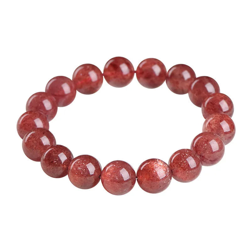 Natural starlight cherry red strawberry quartz bracelet with geometric beads on wrist