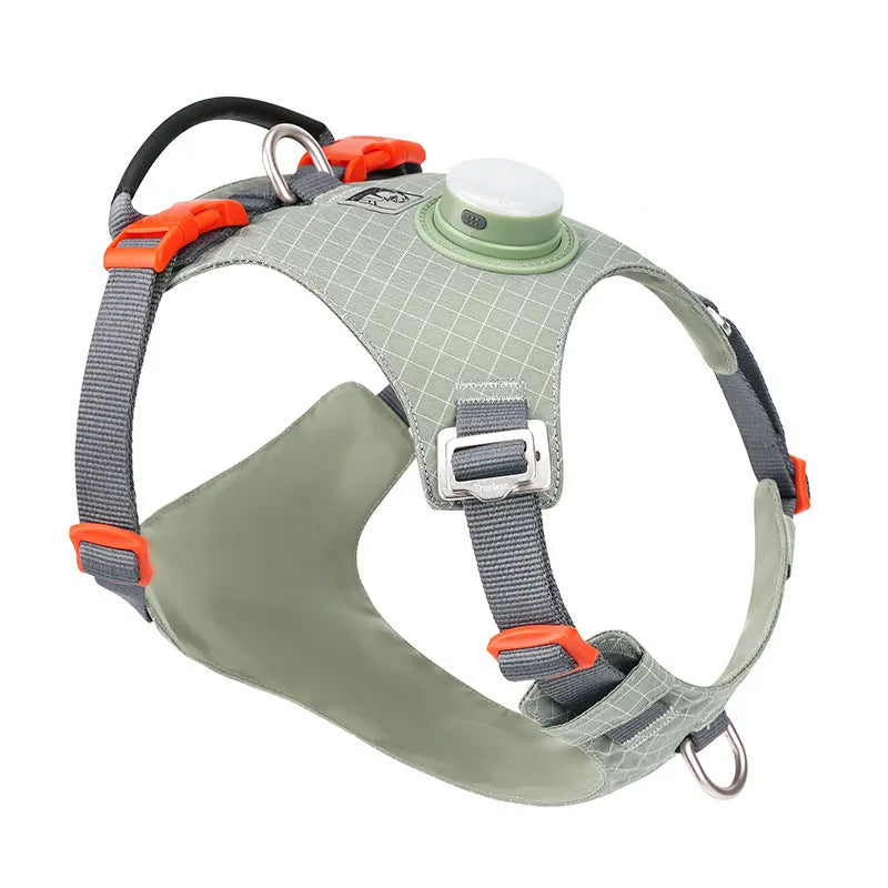 A light purple adjustable nylon dog harness with an LED light on the chest strap.