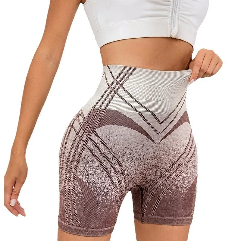 Brown and black gradient high waisted fitness shorts for women on a mannequin.