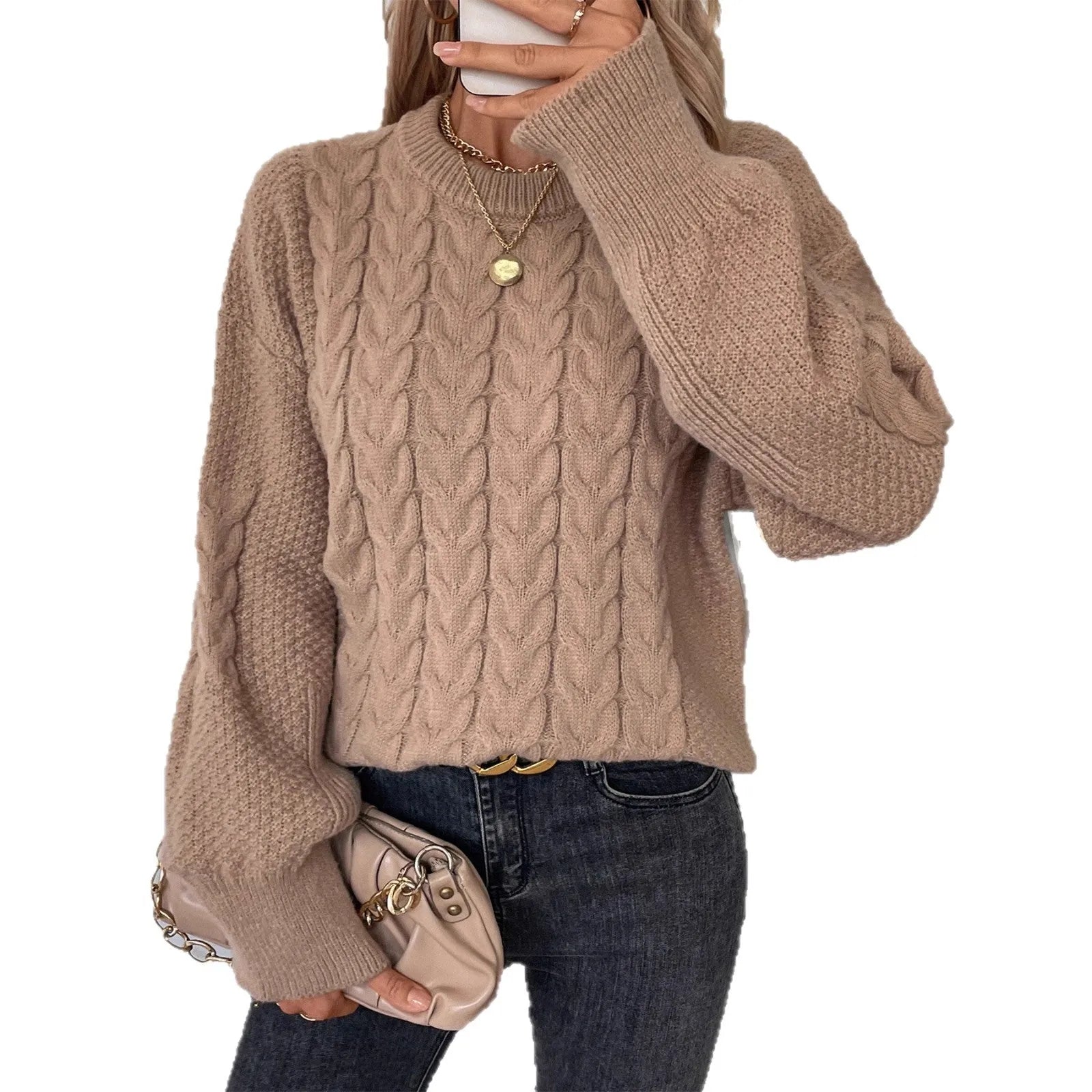 Women's beige loose sweater with round neck and twisted yarn detail on solid polyester fabric
