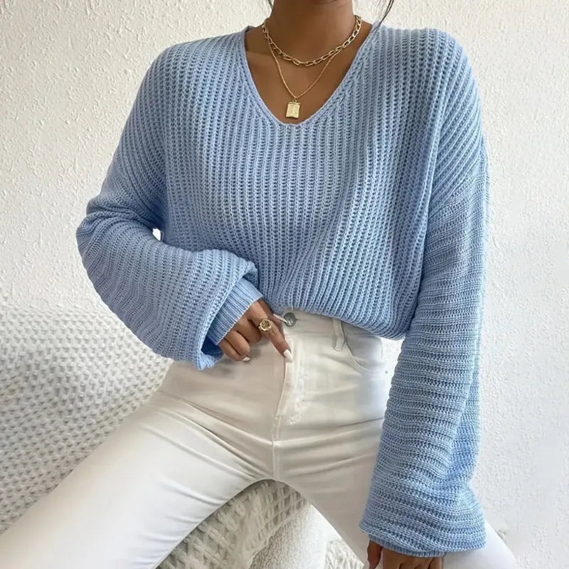 Women's solid colour long sleeve polyester pullover jumper in regular fit, shown in available colours.