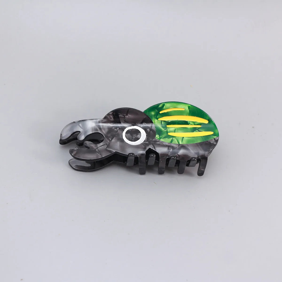 Handmade cellulose acetate beetle grip in cartoon style for insect biology observation