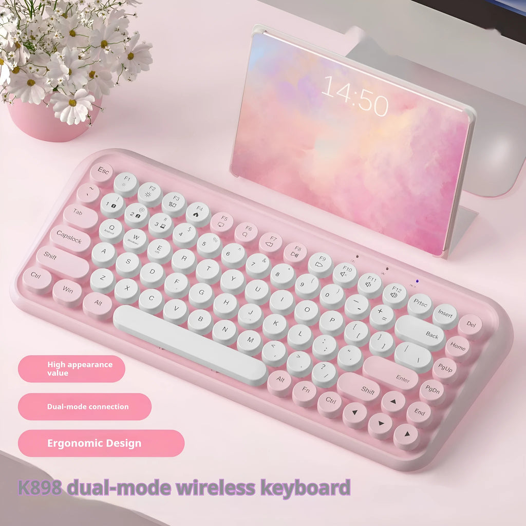 Pink dual-mode wireless Bluetooth keyboard with 84 keys and portable design