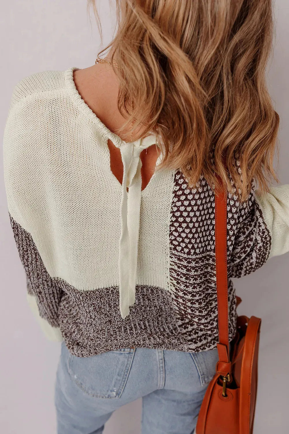 Dark khaki and black colour block loose sweater with drop shoulders and a back tie fastening.