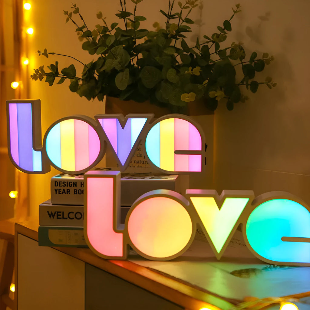 Rainbow style LED LOVE decorative light on a tabletop