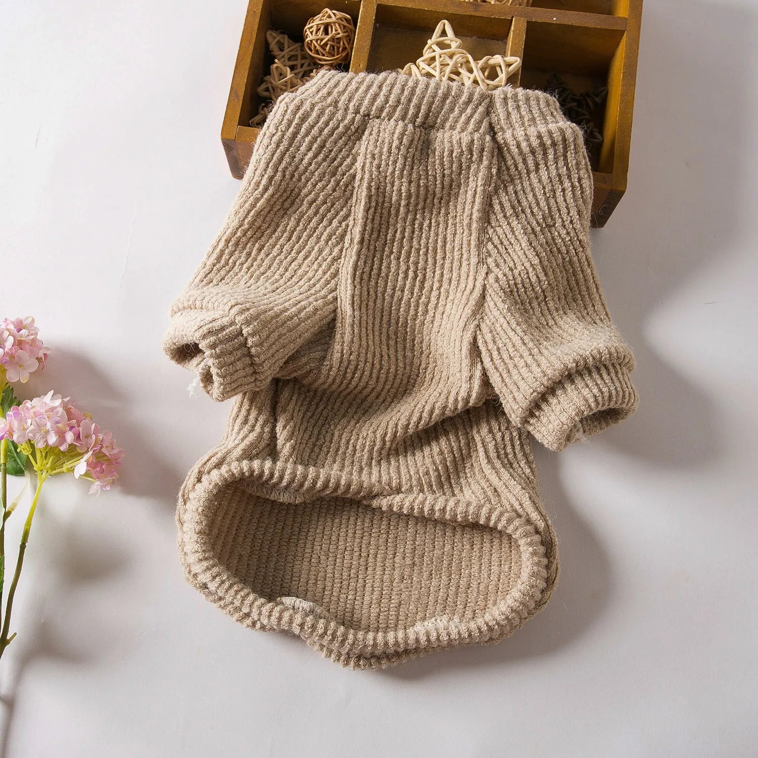Brown knit pullover sweater on small dog showing casual style and fit
