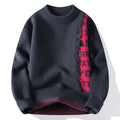 Men's loose grey knitted pullover with ribbed hemline on a hanger