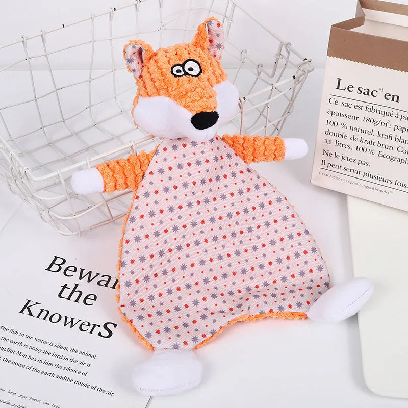Brown plush fox dog toy with squeaker on a grey background.