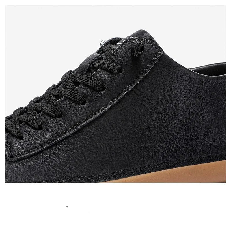 Men's black casual leather shoes with round toe, flat heel, and lace-up closure