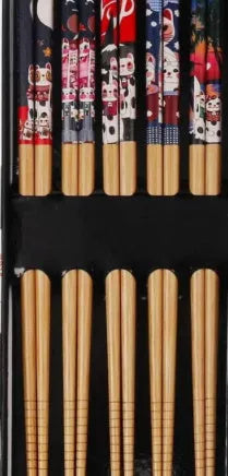 Set of five pairs of bamboo chopsticks with Japanese cartoon patterns in a gift box.