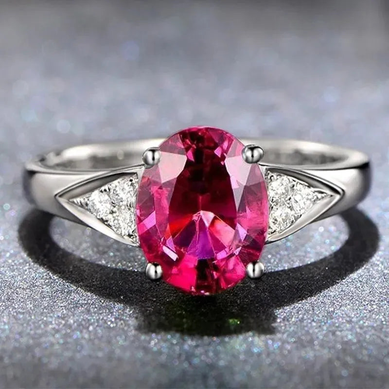 Ladies natural zircon ring with heart, water drop, or bell pattern in court setting, red or blue stone
