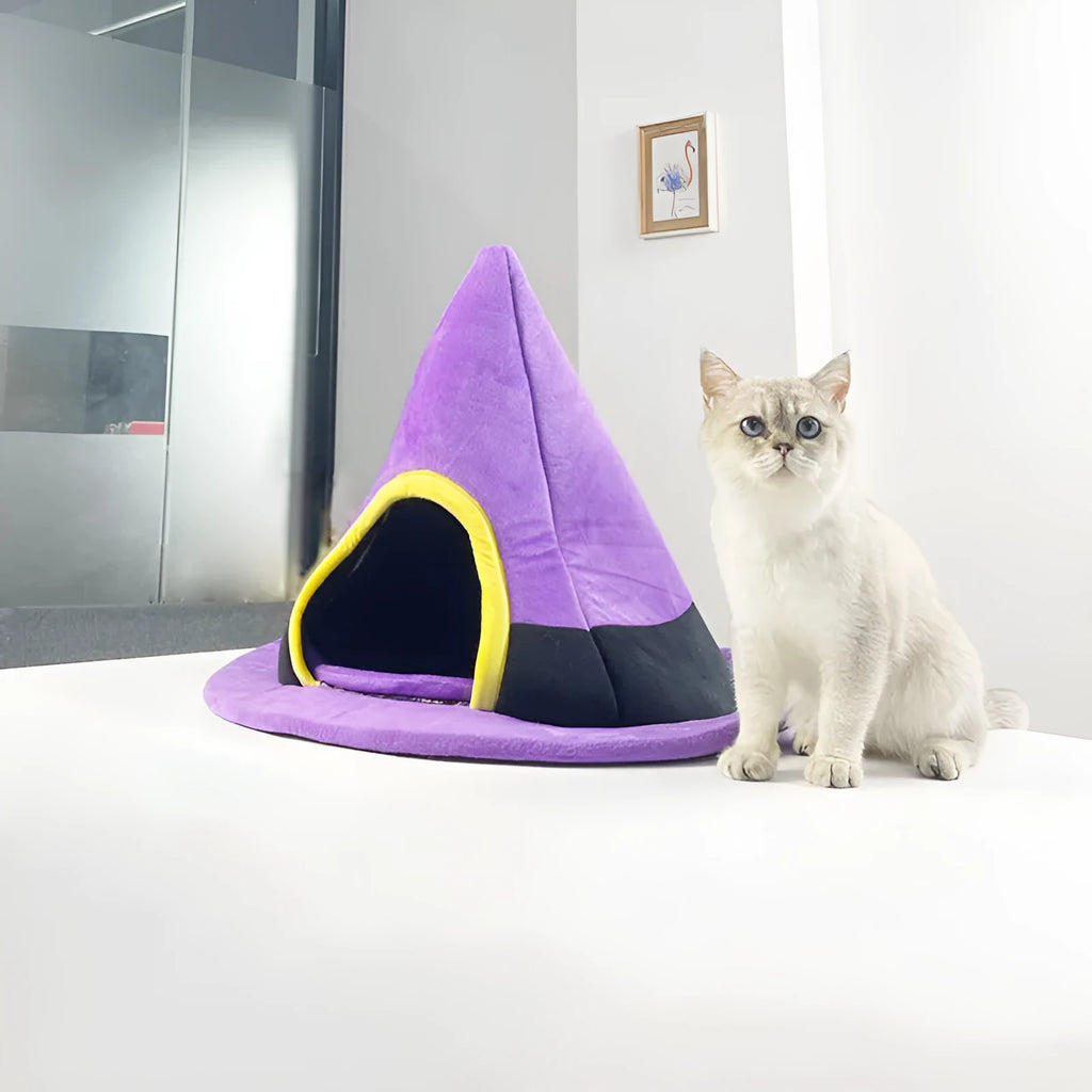 Purple cloth Halloween witch hat shaped cat bed measuring 60x45cm for cats
