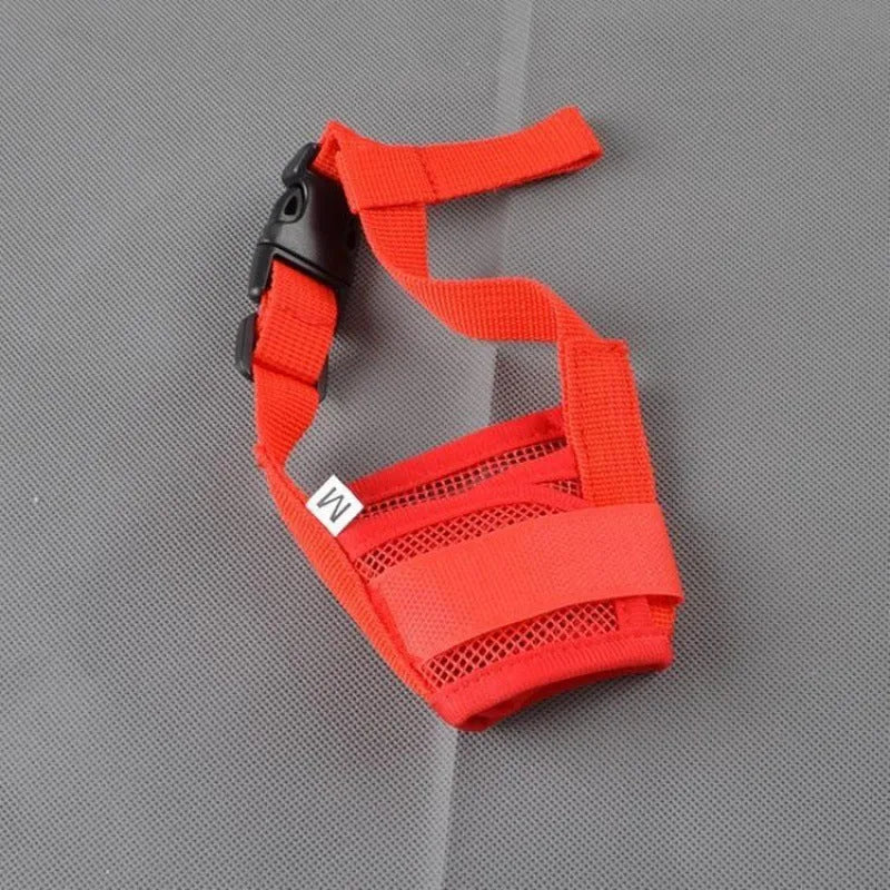 A plastic adjustable dog muzzle shown in multiple colours including black, blue, and pink.