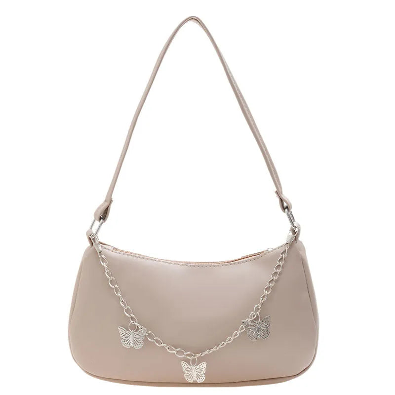 Horizontal square PU leather crossbody bag with butterfly chain detailing in light blue colour
