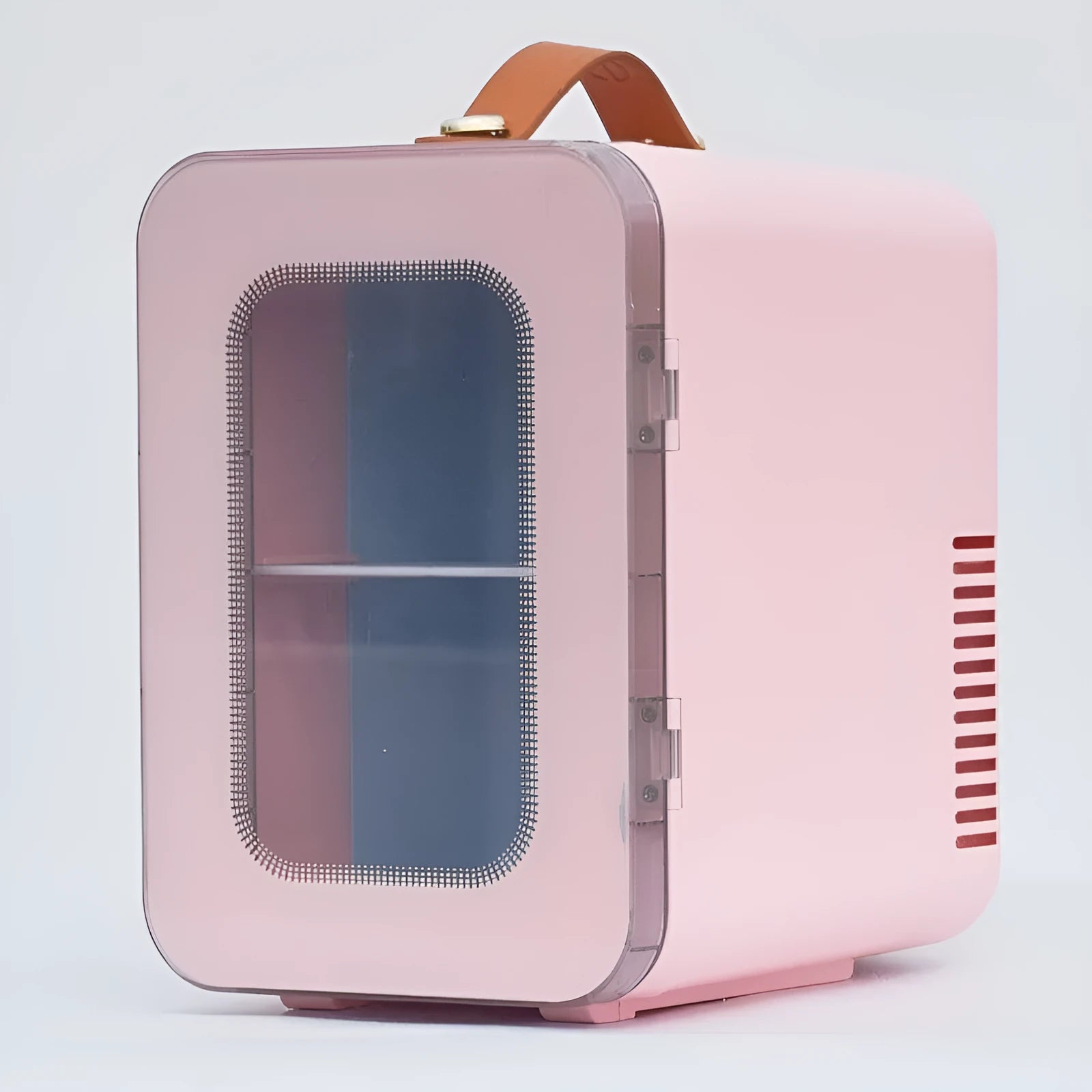 Pink mini refrigerator with transparent door showing interior storage for cosmetics