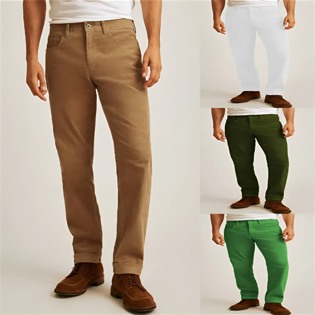 Corduroy straight-leg trousers in green displayed flat showing mid-waist design and zip fly