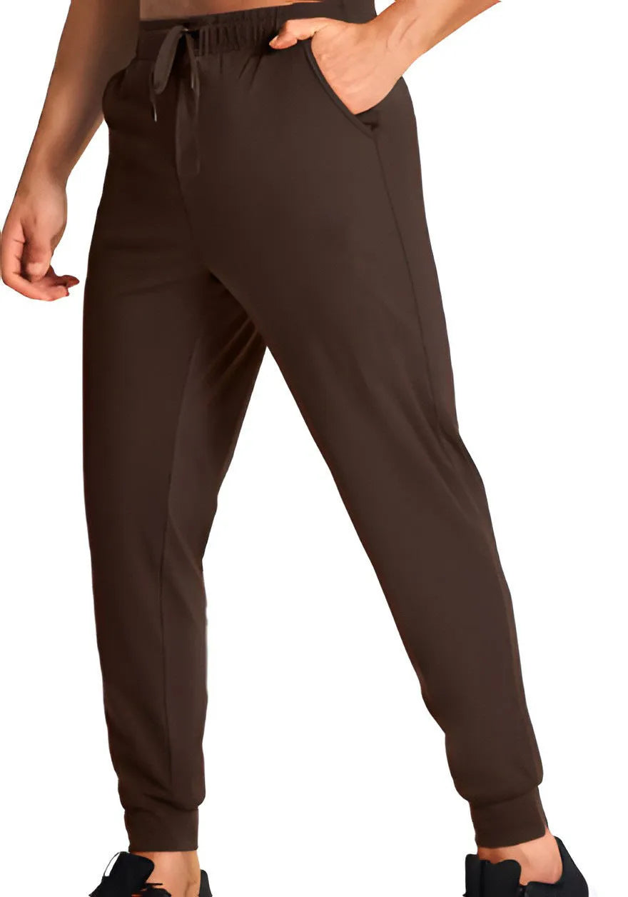 Men's loose casual polyester trousers in solid colour with size range label