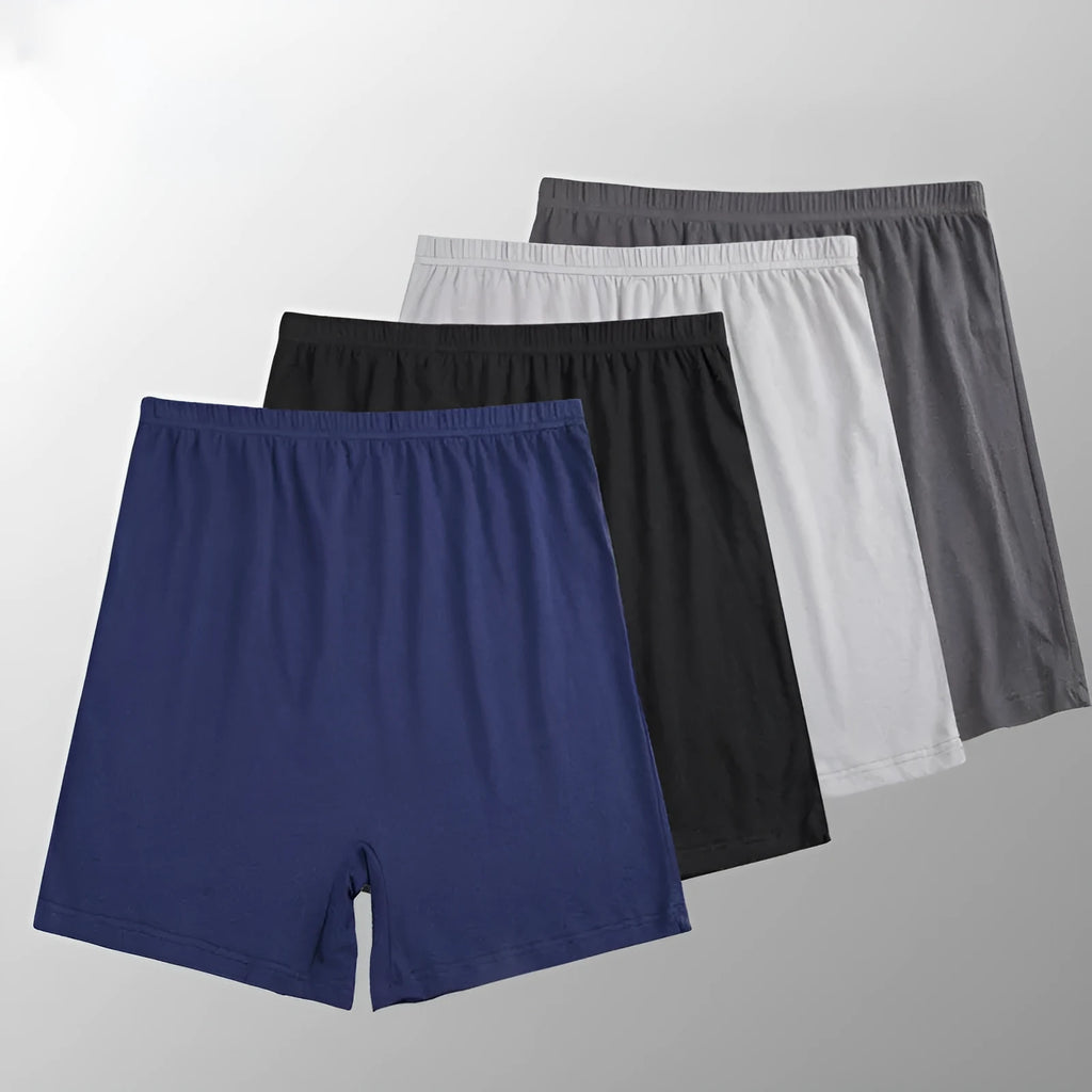 Men's solid colour modal boxers on a white background, showing high-waist design in black, blue, and gray.
