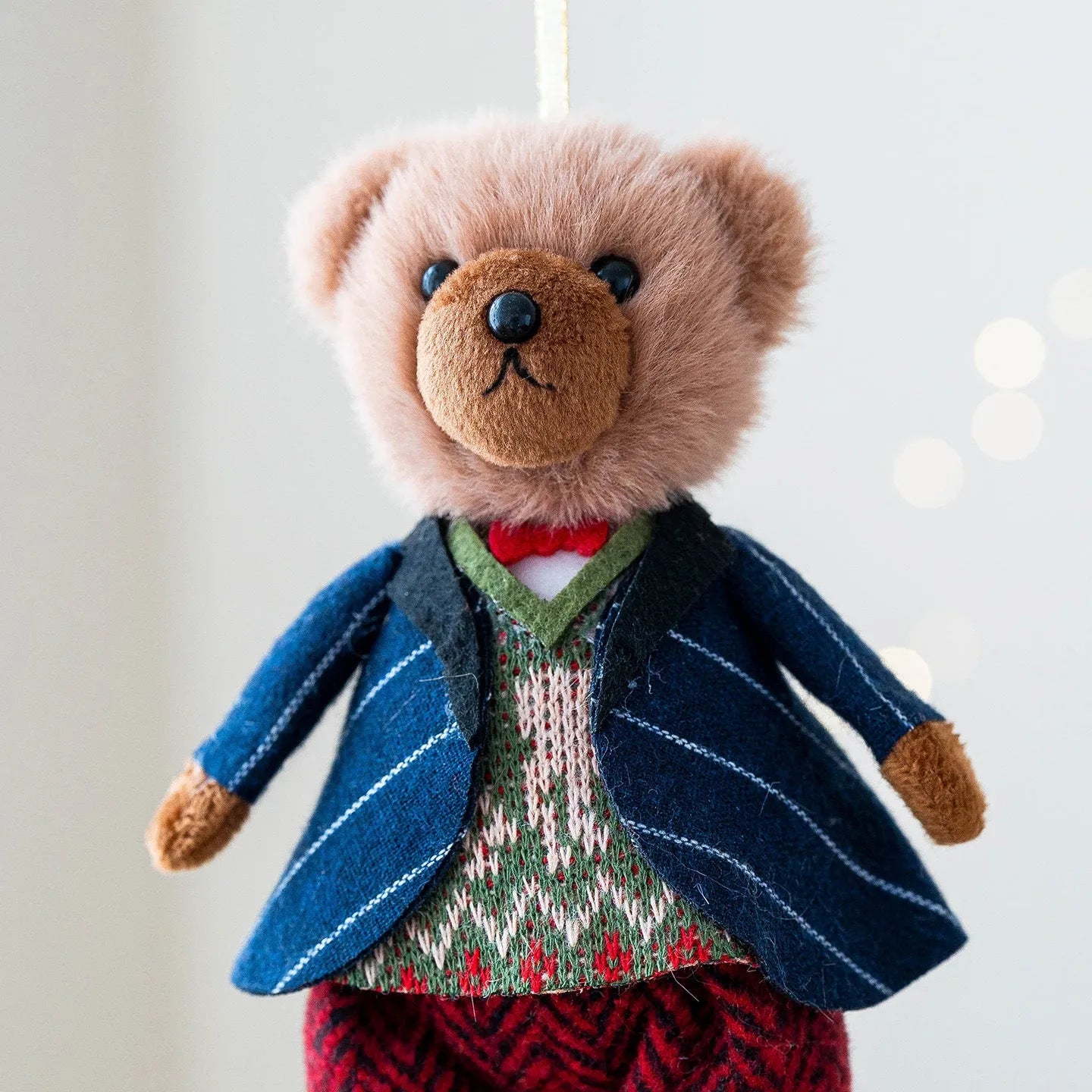 Pair of cartoon plush bear dolls, a princess and a gentleman, wearing cotton suits with a plaid tartan pattern.