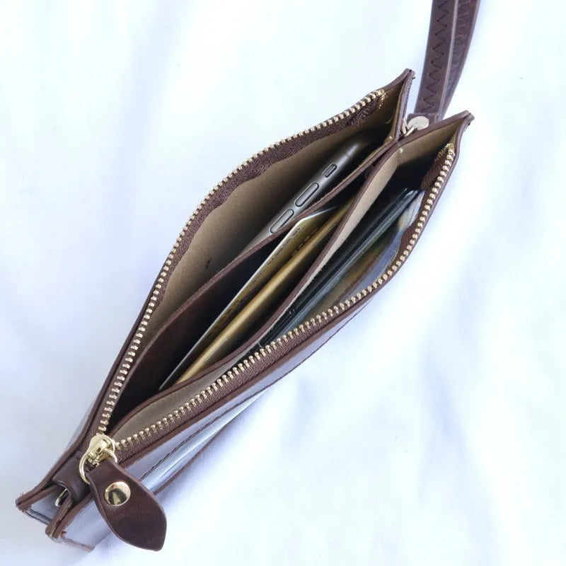 Mini touch screen phone bag in cross square shape with soft surface material, blue colour, and zippered pockets