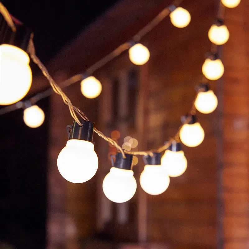 10 metre black wire solar festival lights with 40 warm white LED lamps and transparent ball covers