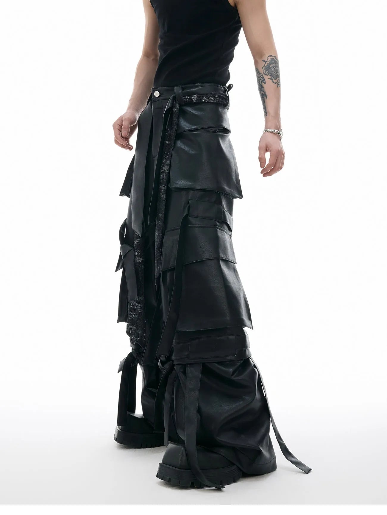 Black loose-fit retro pants with quilted stitching and multiple pockets on a model