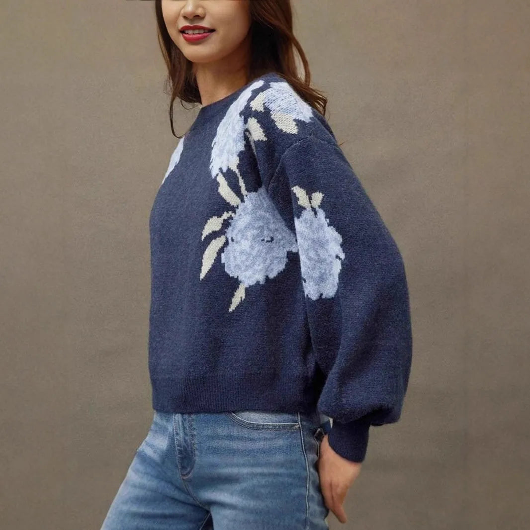 Sapphire blue women's loose pullover sweater with a detailed woven floral jacquard pattern and off-neck design.