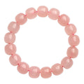 Natural pink crystal barrel bead bracelet with 8x10mm geometric polished beads