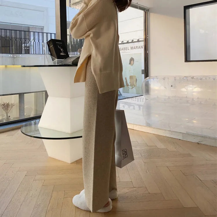 Women's high waist knitted wide-leg trousers in cream white colour with dropped mopping style