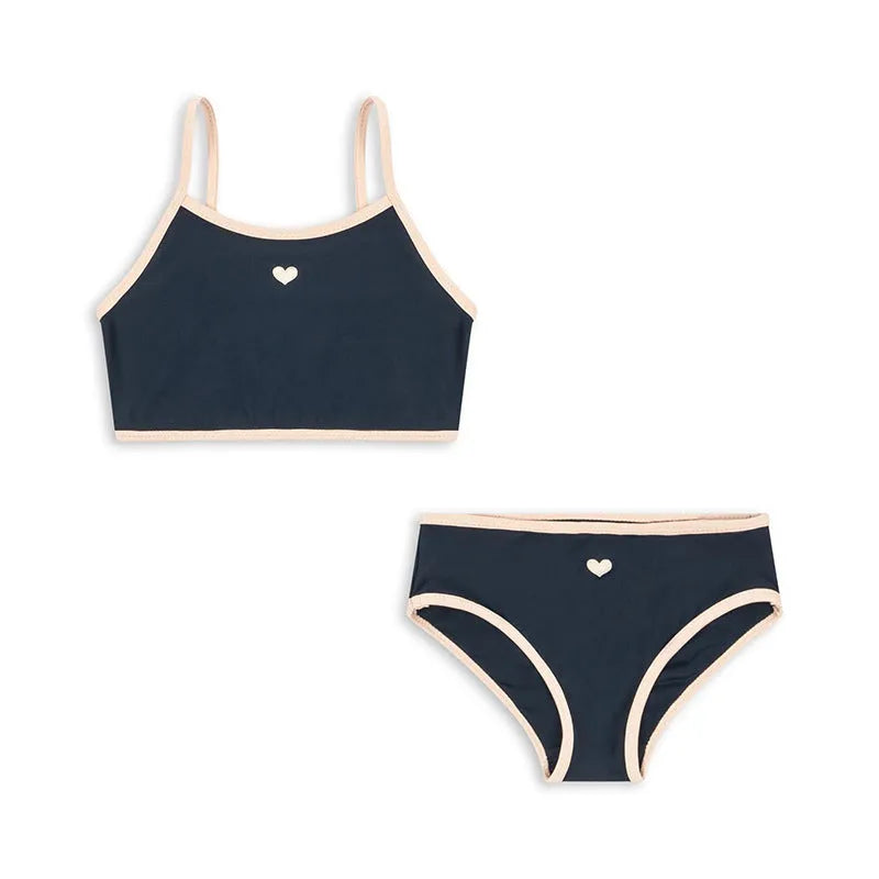 Dark blue baby girl swimsuit in polyester with Lycra lining for swimming activities