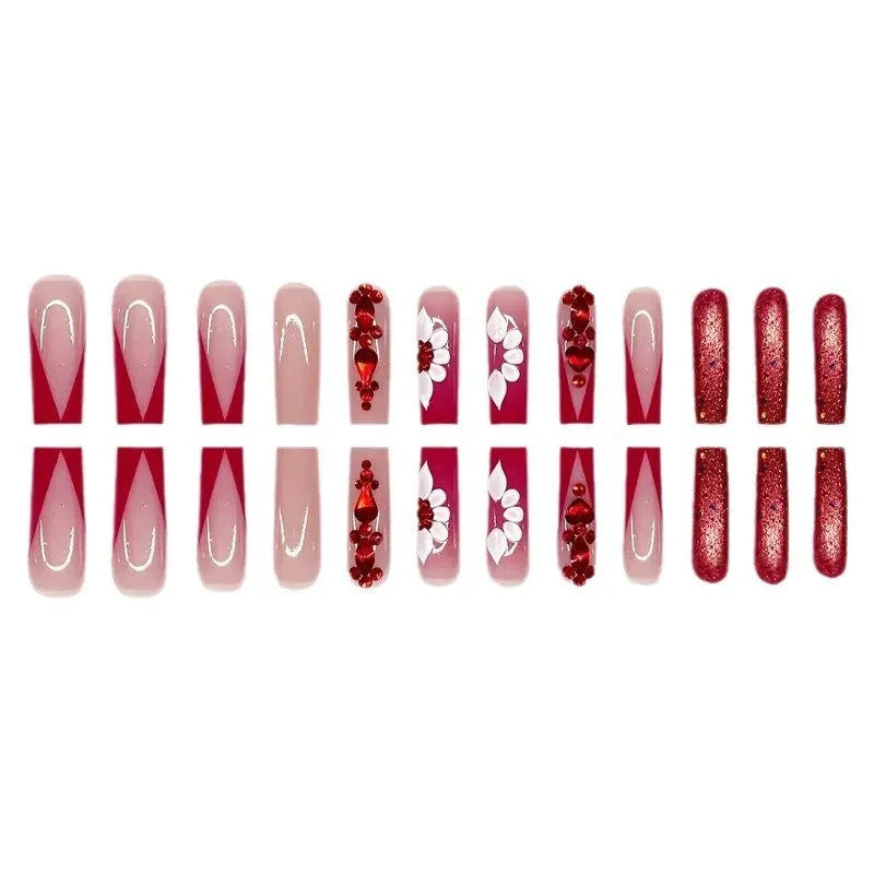Floral press-on fake nails with prismatic red diamond accents in European square long shape