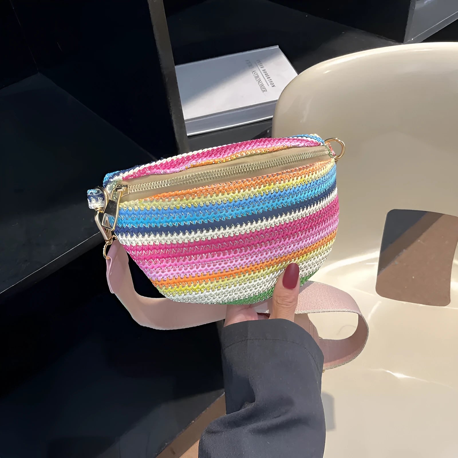 Blue straw woven shell-shaped beach bag with single shoulder strap and bohemian design