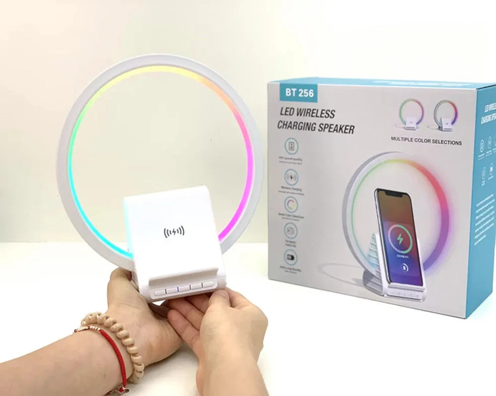 White rectangular Bluetooth speaker with wireless charging top and slim 10mm profile