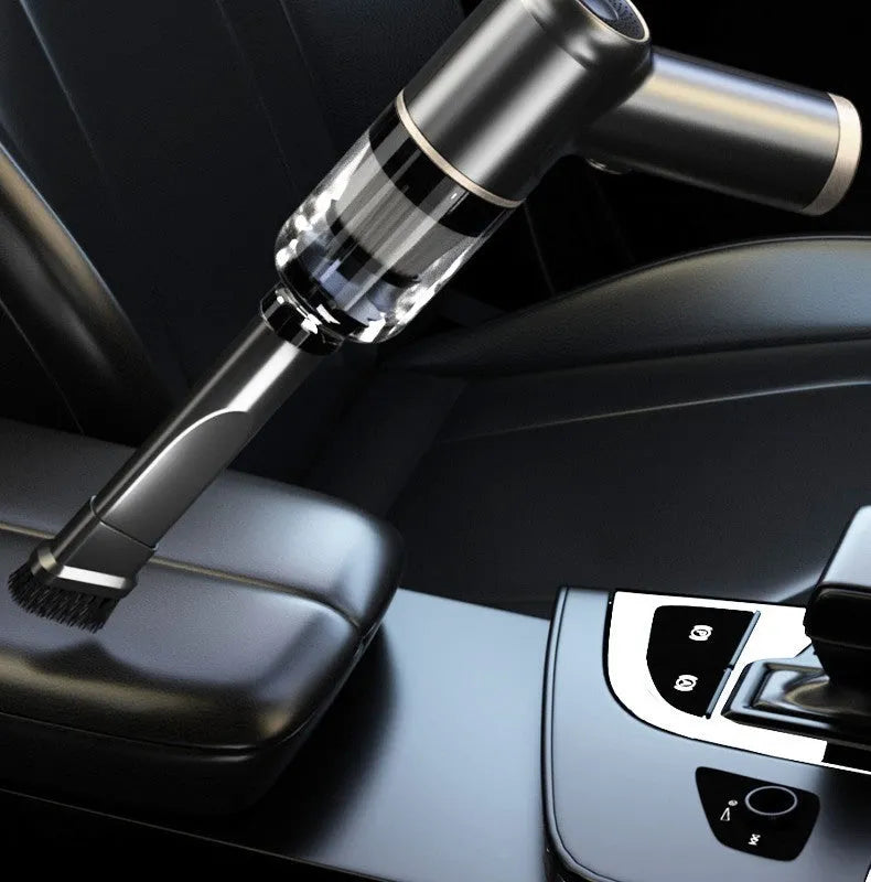 Black wireless handheld vacuum cleaner with tyre inflator and multiple nozzle attachments