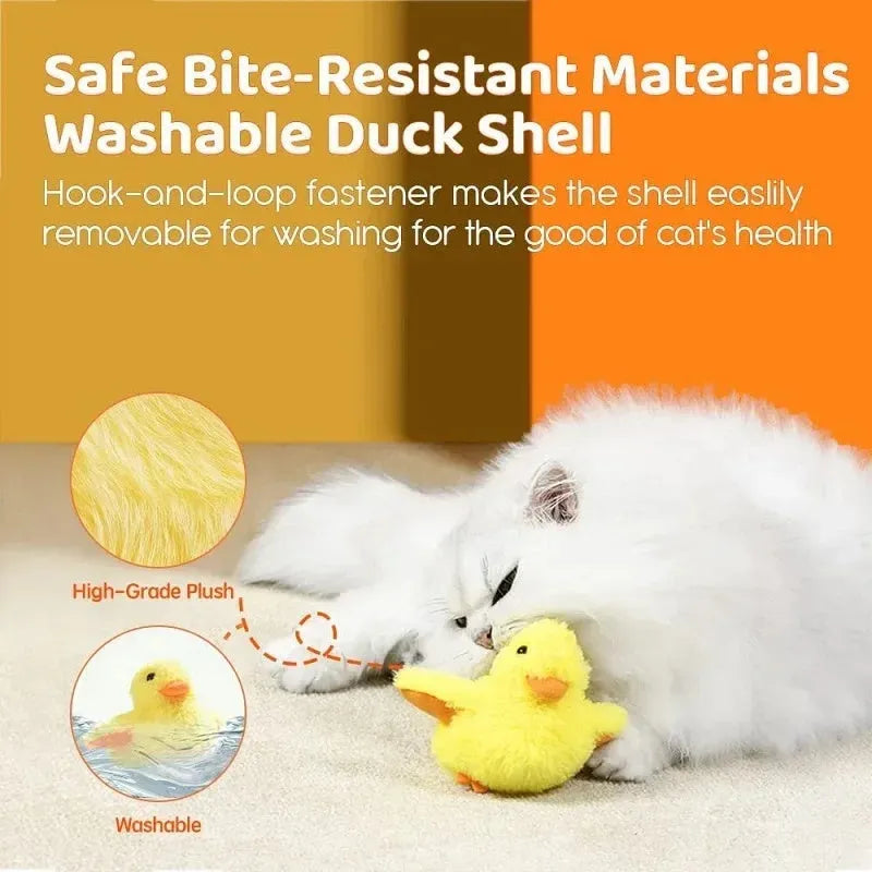Yellow chick-shaped electric interactive cat toy with plush cover on a plain background.
