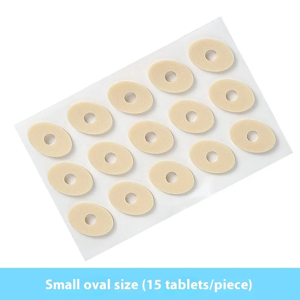 Assortment of clear gel corn protector pads in oval, U-shaped, and circular shapes on a white background.