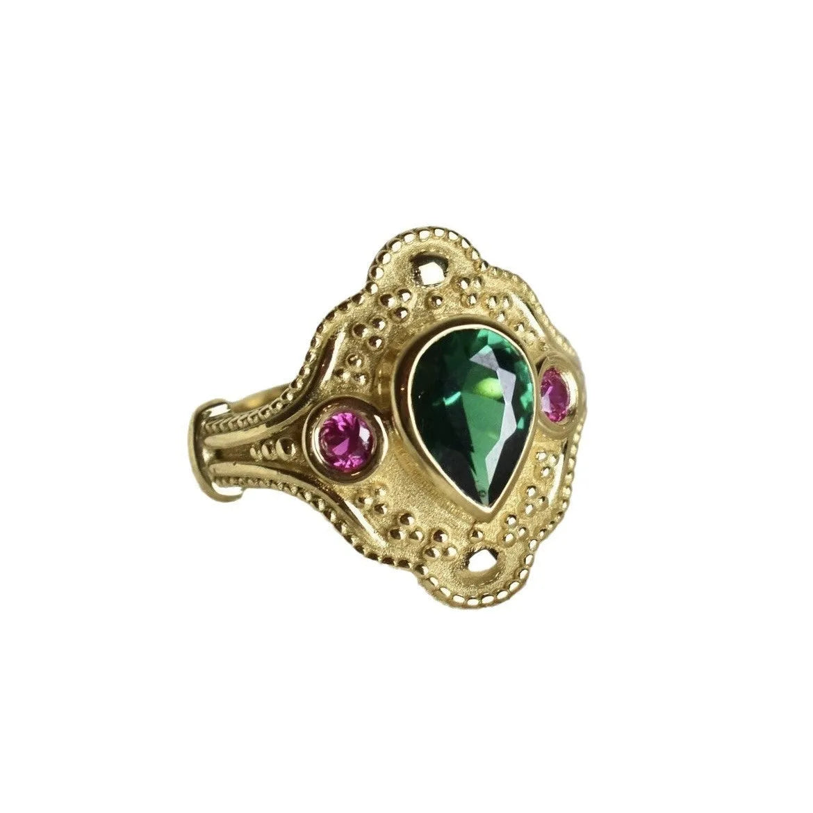 Women's geometric fashion ring in golden lvzuan colour on a grey background.