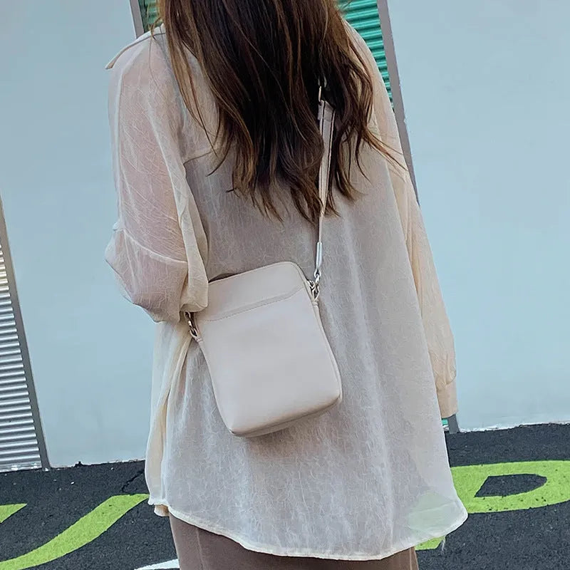 Solid colour small crossbody shoulder bag for mobile phone in PU leather