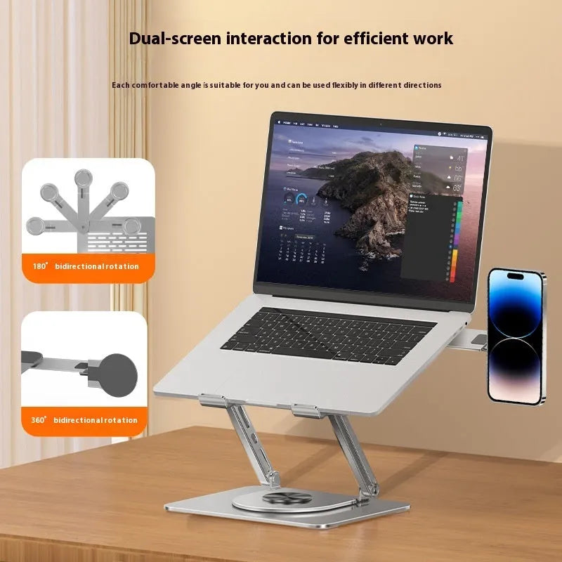 Silver carbon steel laptop stand with a side-mounted magnetic mobile phone holder on a desk