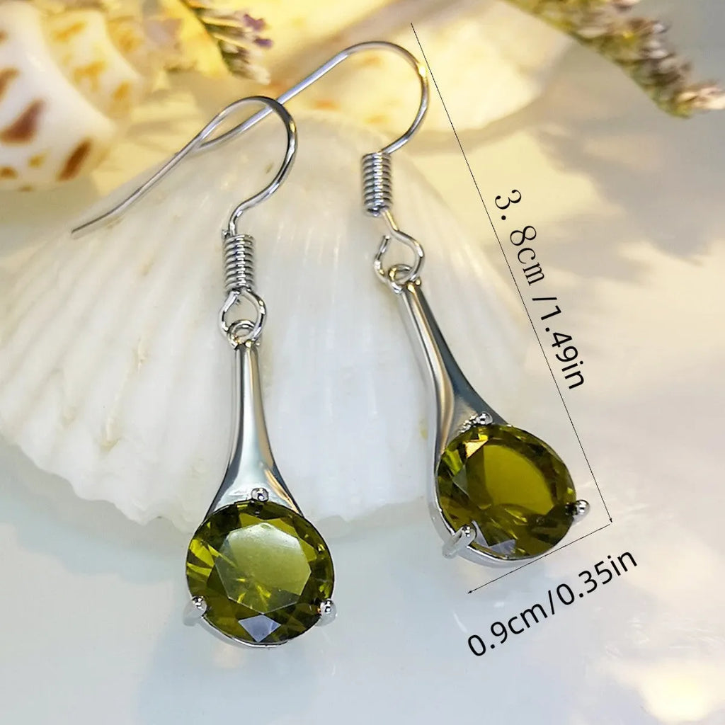 Olive green topaz drop earrings with water drop shape design and alloy construction