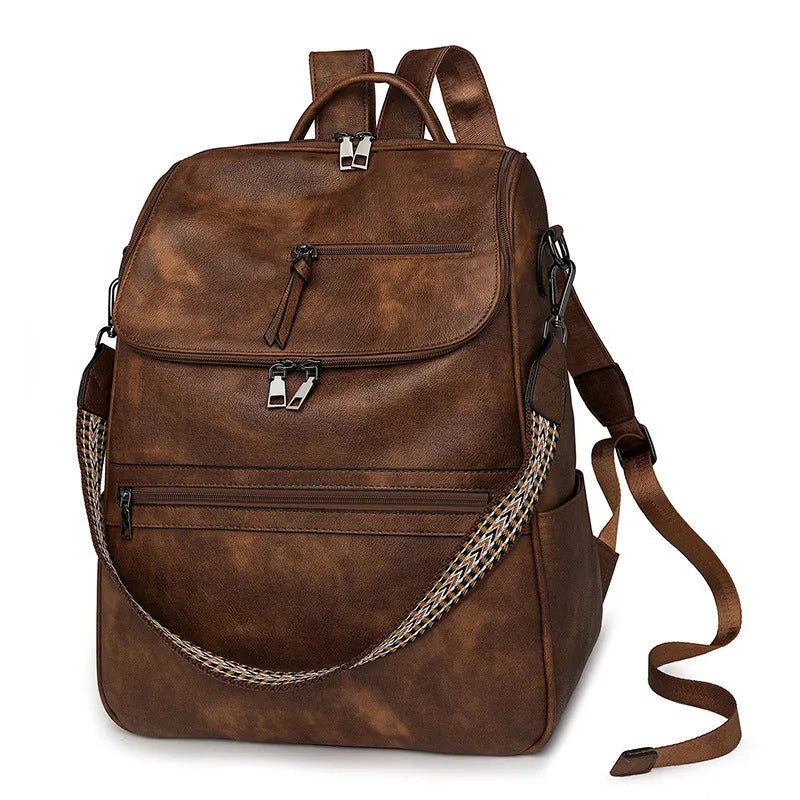 Retro college student backpack in black with curved shoulder straps and stitching detail