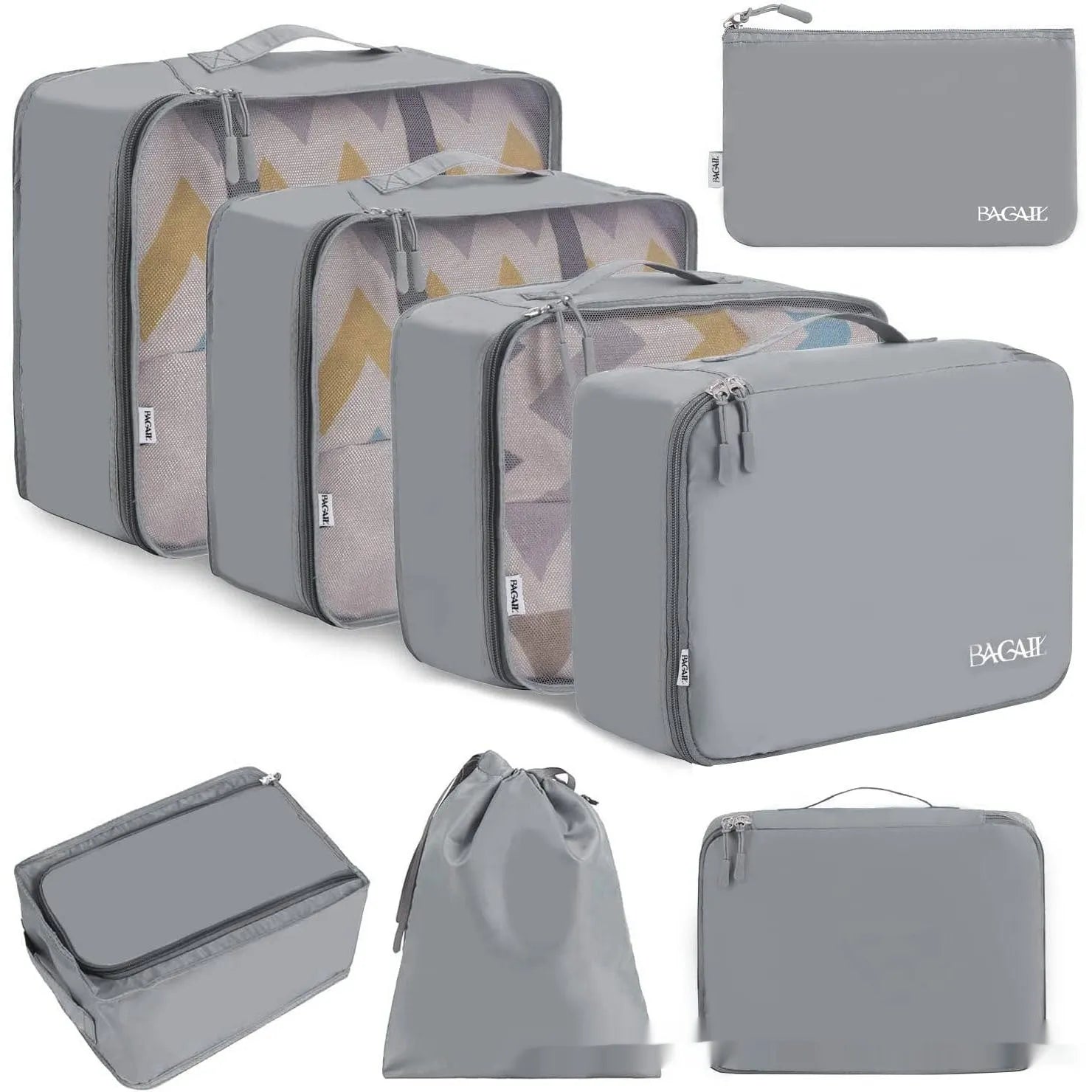 Set of eight cubic-shaped travel packing bags in assorted colours including beige, black, pink, and leopard print patterns.