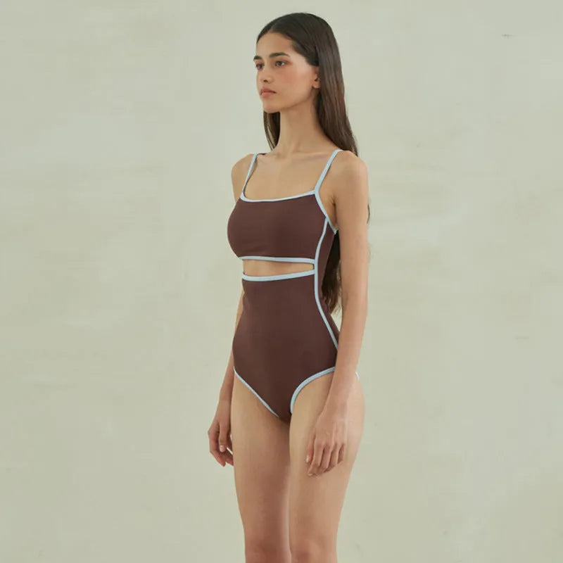 Brown triangle-style one-piece swimsuit for women on a mannequin.
