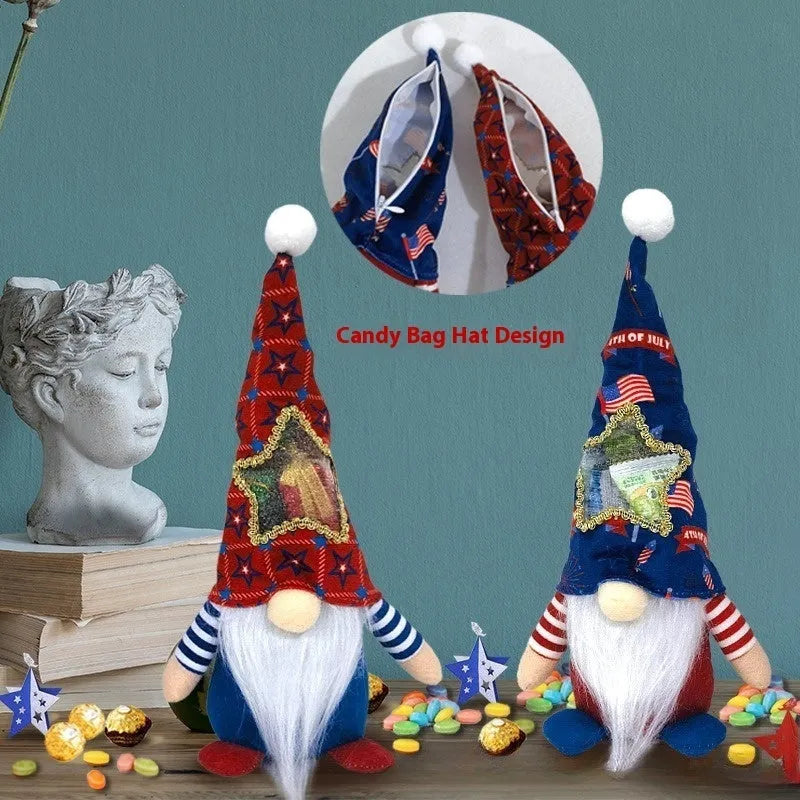 Two red and white faceless cloth baby doll ornaments for Christmas display or use as candy bags.
