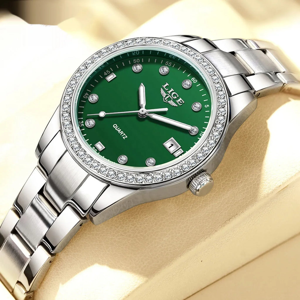 Silver fashion quartz watch with diamond-encrusted dial, stainless steel case, and luminous hands