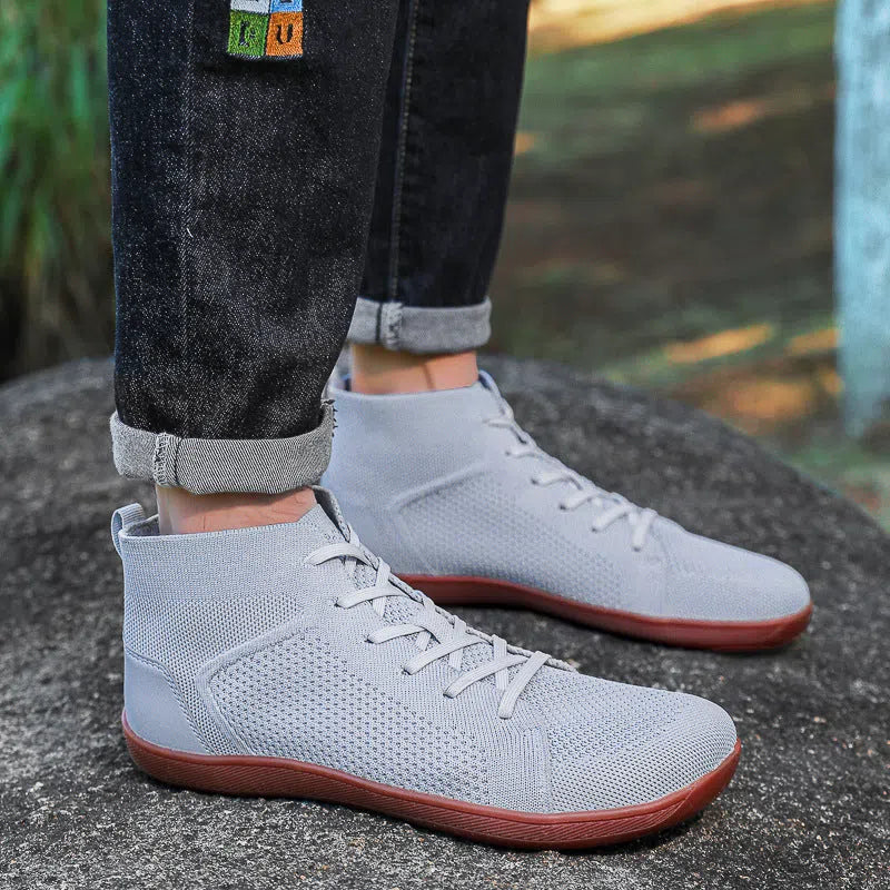 Anti-slip wide-toe barefoot casual fitness yoga shoes in black with breathable fly knitting and leather upper, mid-top design, low heel 1-3cm