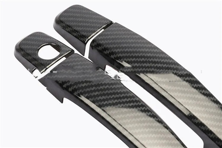 Carbon fibre pattern stick-on overlay for Opel Vauxhall Astra 2004-2015 interior door handle.