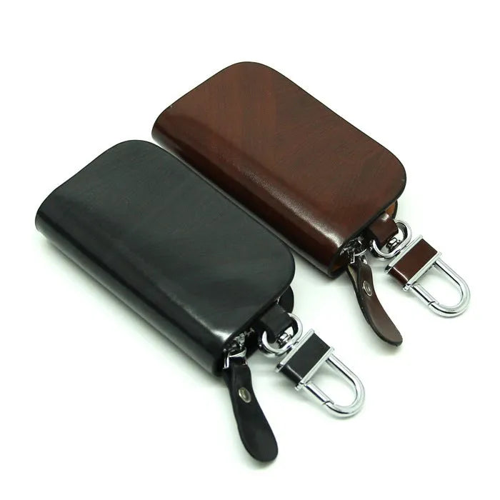 Genuine cowhide leather car key case with frosted finish in black and brown colours.